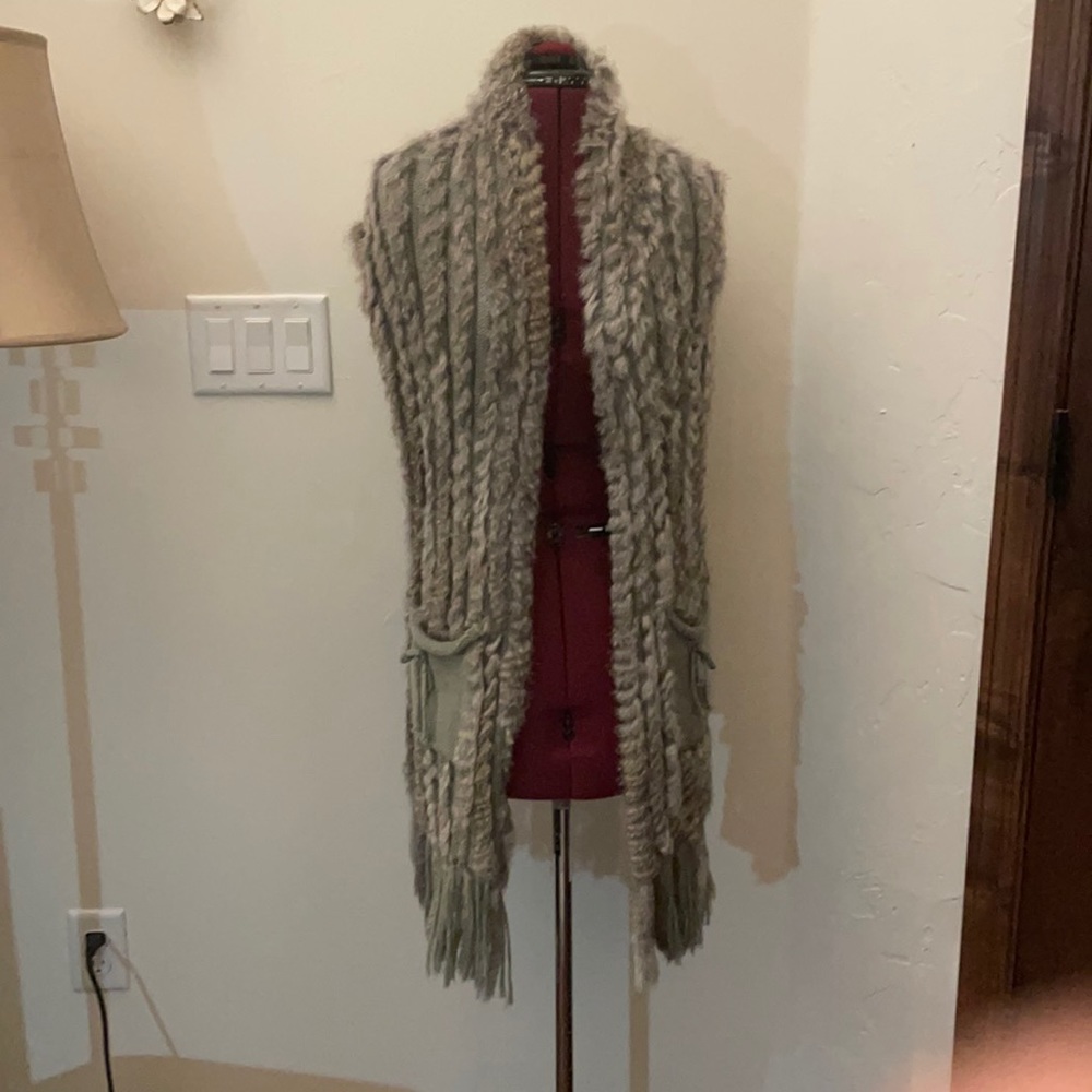 100% rabbit,vest,Acrylic knit,Made in Turkey,elegant,cool pockets Never worn.